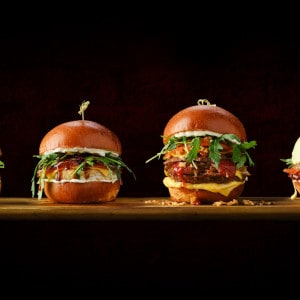 Set of four burgers with different types of meat